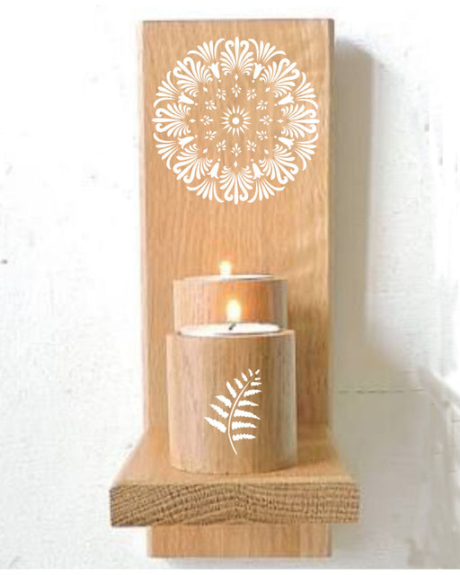 Stencil painting on wooden candle holder backround